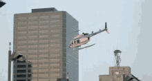 helicopter flying building