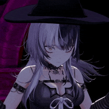 a close up of a witch with a black hat and black gloves