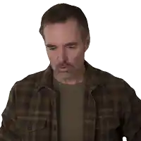 a man in a plaid shirt is drinking a yellow cup of coffee