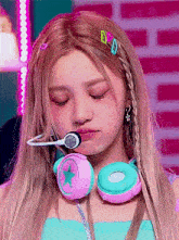 a woman wearing headphones with a star on them