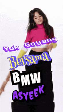 a woman in a pink sweater is standing next to a bmw asyeek