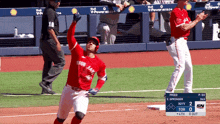 a baseball game is being played with a scoreboard that says fried on it