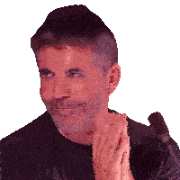 a man with a beard is smiling and clapping his hands