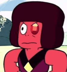 a close up of a cartoon character with a red eye and a red hat .