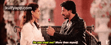 a man is giving a rose to a woman and says do you trust me ? more than myself