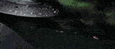 a large space ship with the word ncc on the side