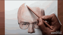 a drawing of a man 's face with glasses is made by animatica