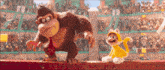 donkey kong standing next to a stuffed animal with a cat costume