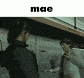 Mae Handshake GIF