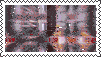 a stamp with a blurry picture of a room with a border .