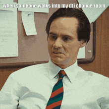 a man in a white shirt and tie with the caption when someone walks into my dti change room on the bottom