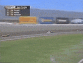 a race track with a scoreboard that says ' 241 to go ' on it