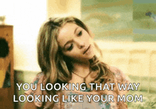 a woman is looking that way looking like her mom