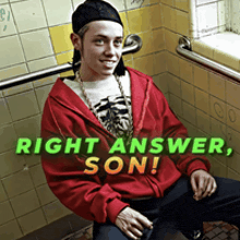 a man in a red jacket is sitting in a bathroom with the words right answer son written on the bottom