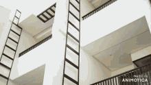 a building with stairs and a made in animatica logo