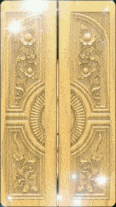 a picture of a woman behind a carved wooden door with the letter a above it