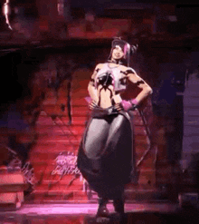 a woman in a costume is dancing on a stage in front of a staircase .