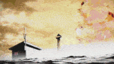 a small house with a tower on top of it in the middle of the ocean
