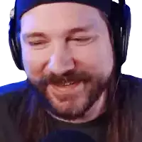 a man with long hair and a beard wears headphones