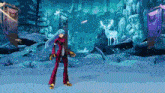 a woman in a red suit is standing in a snowy forest .