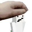 a pixel art of a hand holding a white block with a face .