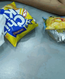 a bag of lays chips is on a table