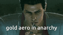 a man smoking a cigarette with the words " gold aero in anarchy " below him