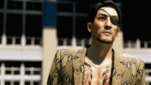 a man with a tattoo on his chest is wearing a snake print jacket