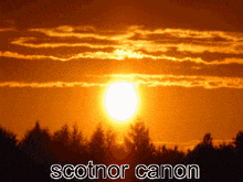 a picture of a sunset with the words scotnor canon in white letters