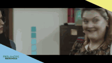 a blurred image of two women with the words freelancers anonymous visible