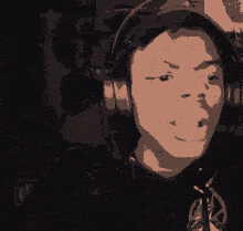 a pixelated image of a man 's face with the letter o on it