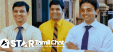 three men are standing next to each other with a star tamil chat logo in the background