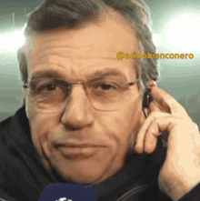 a close up of a man 's face with the hashtag @acidobianconero on the bottom right