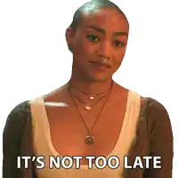 a woman says it 's not too late while wearing a necklace