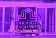 a purple sign that says sarasota square commercial jingle slowed on it