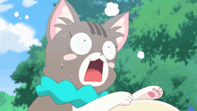 a cat with a surprised look on its face is wearing a blue scarf