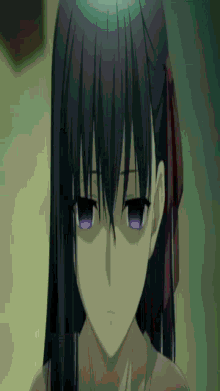 a close up of a person 's face with a purple eye