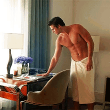 After Shower Reading GIF - After Shower Reading Muscles GIFs