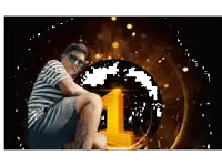 a man wearing sunglasses sits in front of a large number 1
