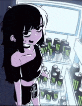 a girl is standing in front of an open fridge full of monster energy drinks