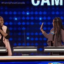 two women on a family feud game show