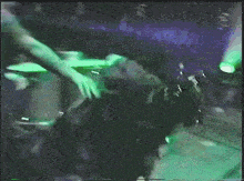 a blurry picture of a person in a dark room