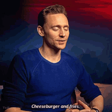 Tom Hiddleston Food GIF - Tom Hiddleston Food Cheeseburger GIFs