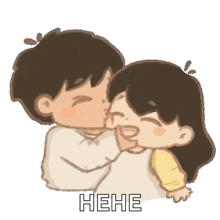a boy is kissing a girl on the cheek while the girl is laughing .