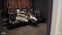 a man laying on a couch in a room with the hashtag mafs on the bottom