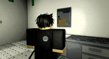 a person standing in a room with a picture on the wall that says ' x '