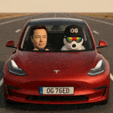 elon musk is driving a red tesla with a license plate that says og 76ed on it