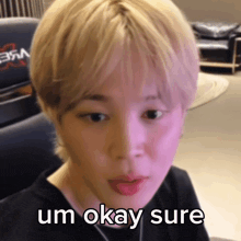 a person with blonde hair says um okay sure