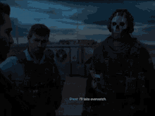 a video game screen shows a man talking to a masked soldier