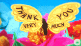 a yellow butterfly with the words thank you very much on its wings